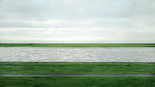 Rhein II is a photograph made by German visual artist Andreas Gursky in 1999.