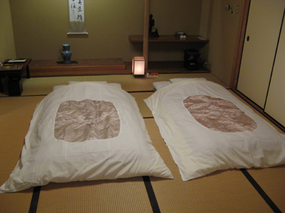 Japanese-style futons laid out for sleeping.