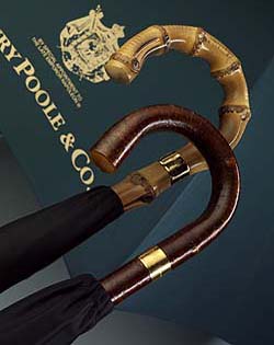 Henry Poole & Co. luxury umbrellas with wooden handles, brass collars engraved with Henry Poole & Co.