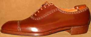 John Lobb Wholecut with Cap Laid Under Facings Brogued Oxford Shoe.