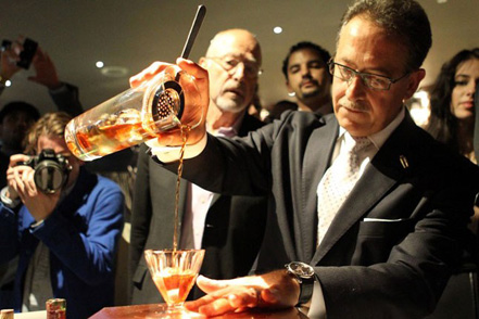 Italian bartender Salvatore Calabrese mixing the world's most expensive cocktail.