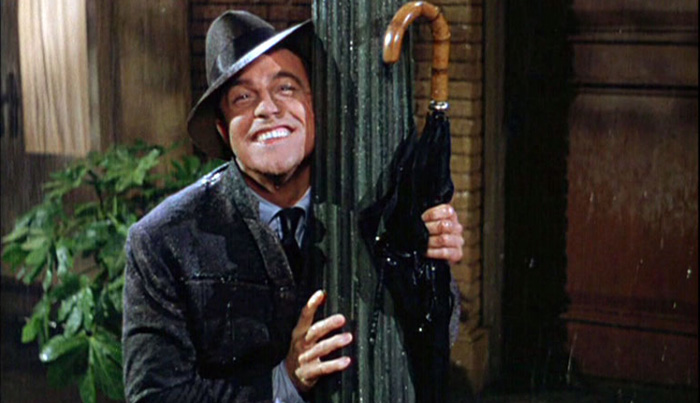 Gene Kelly with his famous umbrella in the film 'Singin' in the Rain'.