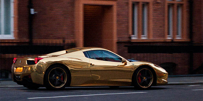 Gold-plated Ferrari 458 Spider powered by a 4.5-litre V8 engine with a top speed of 199 mph.