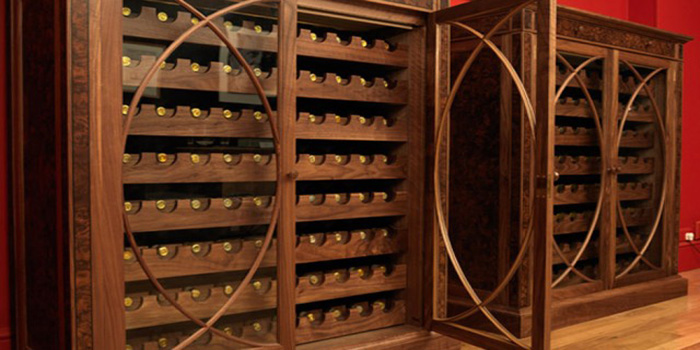Linley bespoke wine cabinets made in American walnut.