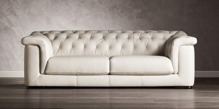 Natuzzi white leather sofa.