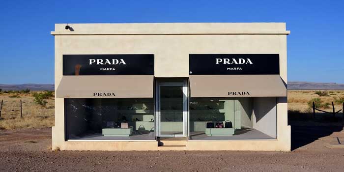 Prada Marfa is a permanently installed sculpture by artists Elmgreen and Dragset, about 60 km (37 mi) northwest of the city of Marfa, US Route 90, Valentine, Texas, U.S.A.
