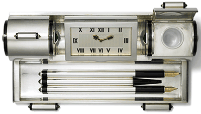 Cartier Paris pour Cartier New York, 1931. Silver desk set with clock.