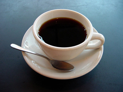 A cup of black coffee.