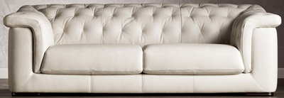 Natuzzi white leather sofa.