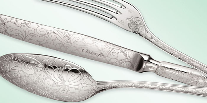 Christofle silver flatware.