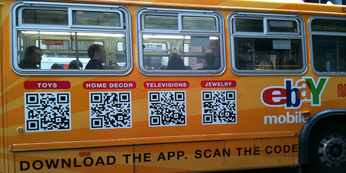 QR code - users with a camera phone equipped with the correct reader application can scan the image of the QR code to display text, contact information, connect to a wireless network, or open a web page in the telephone's browser.