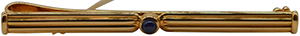 Cartier Tie Clip in 18K Yellow Gold with Cabbochon Sapphire: 2,900.