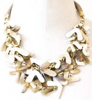 Anna Valentine horn & brass 3 strand short helicopter necklace with macrame neck.