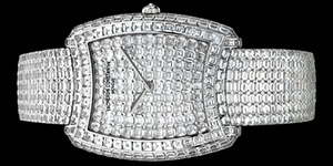 World's Most Expensive Watch #21: Vacheron Constantin Kalla Duchesse Métiers d'Art watch (reference: 81750/S01G-9198) 36 × 45 mm in 18K white gold set with 837 baguette-cut diamonds and 1 round-cut diamond, certified Hallmark of Geneva. Fully paved dial and bracelet, diamond-set crown. Vacheron Constantin Manufacture hand-wound mechanical movement 1400. Price: US$1,275,000
